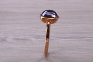 Cabochon cut Iolite set Rose Gold Ring