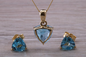 Trillion cut Swiss Blue Topaz Matching Earrings and Necklace set in Yellow Gold