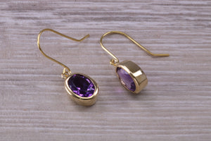 Natural Oval cut Amethyst dropper earrings, set in solid 9ct Yellow gold
