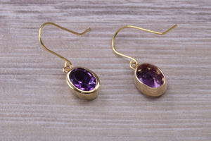 Natural Oval cut Amethyst dropper earrings, set in solid 9ct Yellow gold