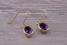 Load image into Gallery viewer, Natural Oval cut Amethyst dropper earrings, set in solid 9ct Yellow gold