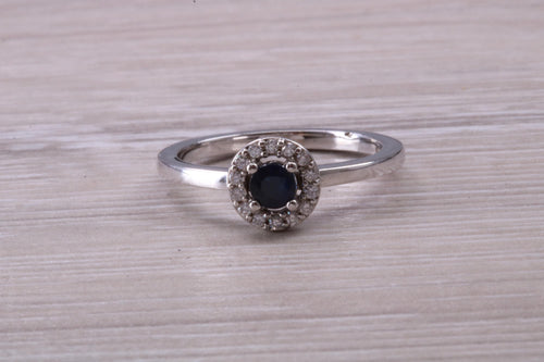 Dainty Blue Sapphire and Halo set Diamond Ring