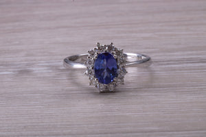 One and Half carat AAA Grade Tanzanite and Diamond Halo Ring