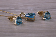 Load image into Gallery viewer, Trillion cut Swiss Blue Topaz Matching Earrings and Necklace set in Yellow Gold