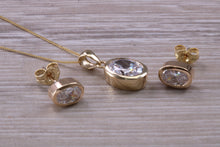 Load image into Gallery viewer, Oval cut 9ct Yellow Gold C Z set Earrings and Matching Necklace
