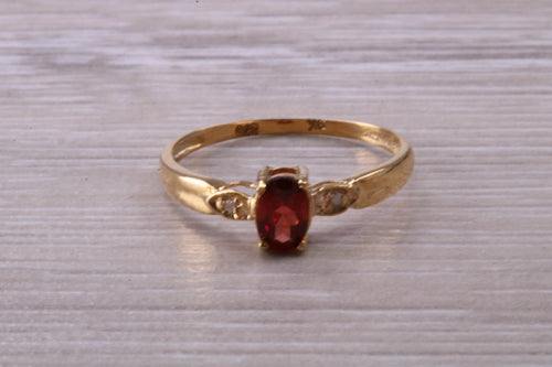 Dainty Garnet and Diamond set Gold Ring