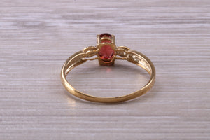 Dainty Garnet and Diamond set Gold Ring