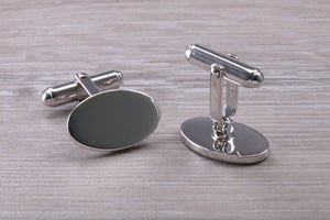 Gentleman's Cufflinks. Oval profile, made from solid sterling silver traditional cufflinks with swivel back fittings.
