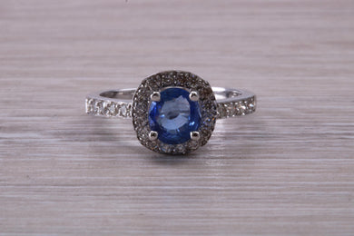 AAA Grade Tanzanite and Diamond Halo Ring