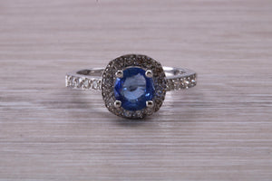 AAA Grade Tanzanite and Diamond Halo Ring