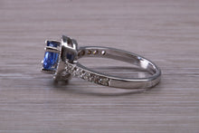 Load image into Gallery viewer, AAA Grade Tanzanite and Diamond Halo Ring