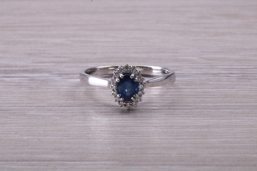 Beautiful Blue Sapphire and Diamond Halo set Ring