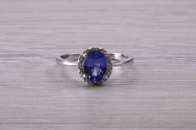 AAA Grade Tanzanite and Diamond Halo Ring