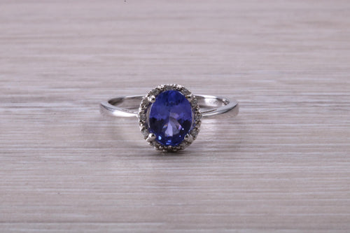 AAA Grade Tanzanite and Diamond Halo Ring