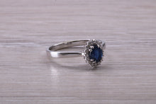 Load image into Gallery viewer, Beautiful Blue Sapphire and Diamond Halo set Ring