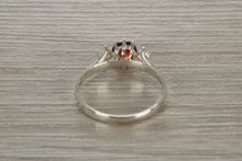Load image into Gallery viewer, Sterling Silver Garnet C Z Trilogy Ring