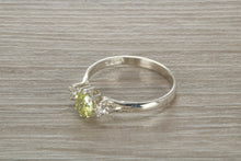 Load image into Gallery viewer, Sterling Silver Peridot C Z Trilogy Ring