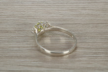 Load image into Gallery viewer, Sterling Silver Peridot C Z Trilogy Ring