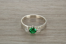 Load image into Gallery viewer, Sterling Silver Emerald Green C Z Trilogy Ring