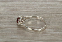 Load image into Gallery viewer, Sterling Silver Garnet C Z Trilogy Ring