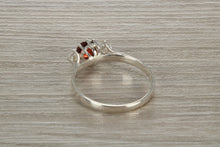 Load image into Gallery viewer, Sterling Silver Garnet C Z Trilogy Ring