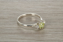 Load image into Gallery viewer, Sterling Silver Peridot C Z Trilogy Ring