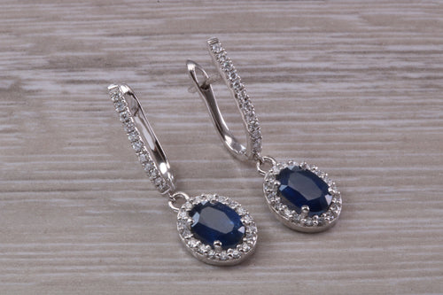 Beautiful Halo set Sapphire and Diamond Dropper Earrings, 2.84ct Total Gemstone Weight