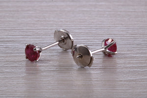 Stunning 1 carat Ruby set Platinum Solitaire Stud Earrings, with Special Safety Backs
