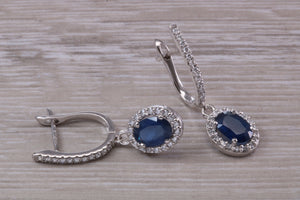 Beautiful Halo set Sapphire and Diamond Dropper Earrings, 2.84ct Total Gemstone Weight