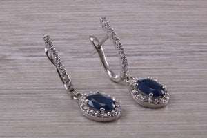 Beautiful Halo set Sapphire and Diamond Dropper Earrings, 2.84ct Total Gemstone Weight