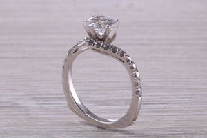 One carat Moissanite Diamond set Crossover Ring with Natural Diamond set Shoulders
