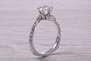 One carat Moissanite Diamond set Crossover Ring with Natural Diamond set Shoulders