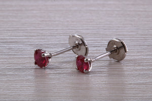 Stunning 1 carat Ruby set Platinum Solitaire Stud Earrings, with Special Safety Backs