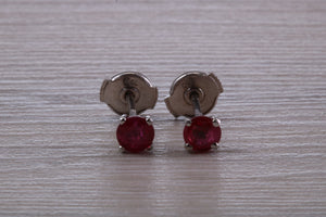Stunning 1 carat Ruby set Platinum Solitaire Stud Earrings, with Special Safety Backs