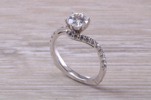 One carat Moissanite Diamond set Crossover Ring with Natural Diamond set Shoulders