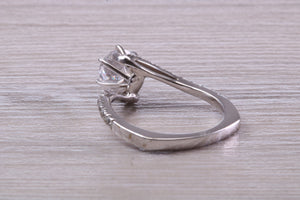 One carat Moissanite Diamond set Crossover Ring with Natural Diamond set Shoulders