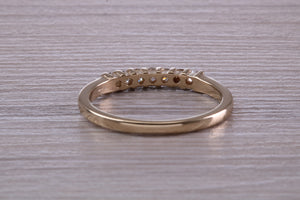 Seven Stone Diamond set Yellow Gold Eternity Ring