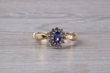 Load image into Gallery viewer, Tanzanite and Diamond Halo Ring