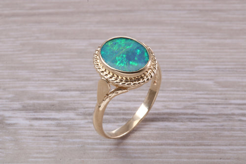Stunning Oval cut Opal set in Solid Yellow Gold Ring