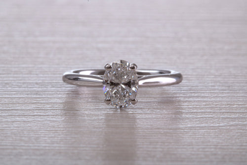 Stunning One carat Certified Oval cut Diamond set Platinum Solitaire