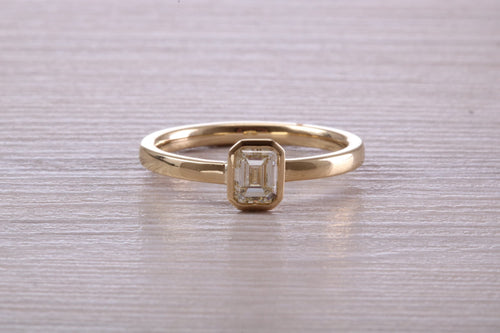 0.70 carat Emerald Cut Diamond set 18ct Yellow Gold Solitaire