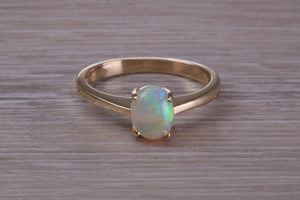 Oval cut Natural Opal set Yellow Gold Ring