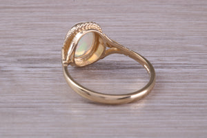 Oval cut Natural Opal set Yellow Gold Ring