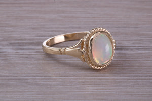 Oval cut Natural Opal set Yellow Gold Ring