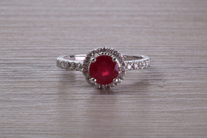 One and Half carat Stunning Ruby and Diamond Halo set Ring