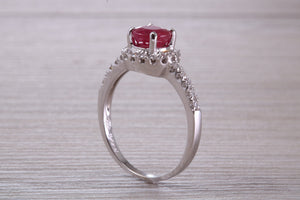 One and Half carat Stunning Ruby and Diamond Halo set Ring