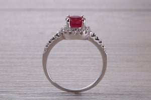 One and Half carat Stunning Ruby and Diamond Halo set Ring