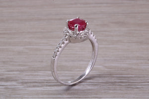 One and Half carat Stunning Ruby and Diamond Halo set Ring
