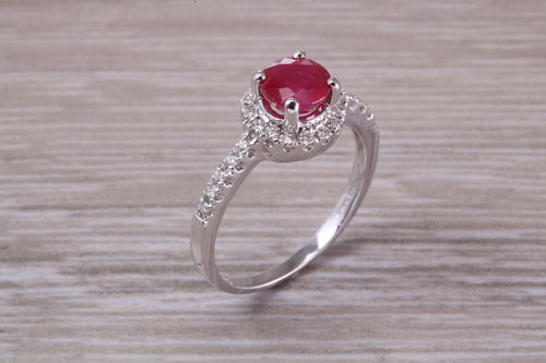One and Half carat Stunning Ruby and Diamond Halo set Ring
