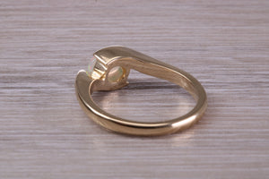 Oval cut Natural Opal set in Chunky Crossover Yellow Gold Ring